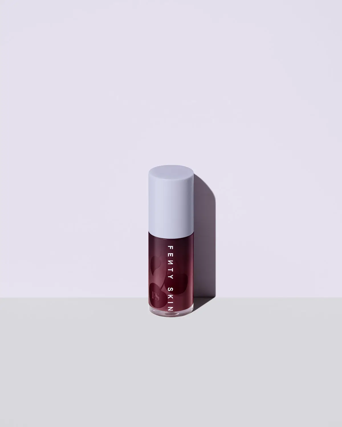 Fenty Treatz Hydrating + Strengthening Lip Oil — Black Cherry Fenty Treatz Hydrating + Strengthening Lip Oil — Black Cherry