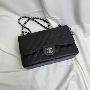Pre-owned CHANEL leather Shoulder Bags Black Quilted Caviar Jumbo Classic Double Flap