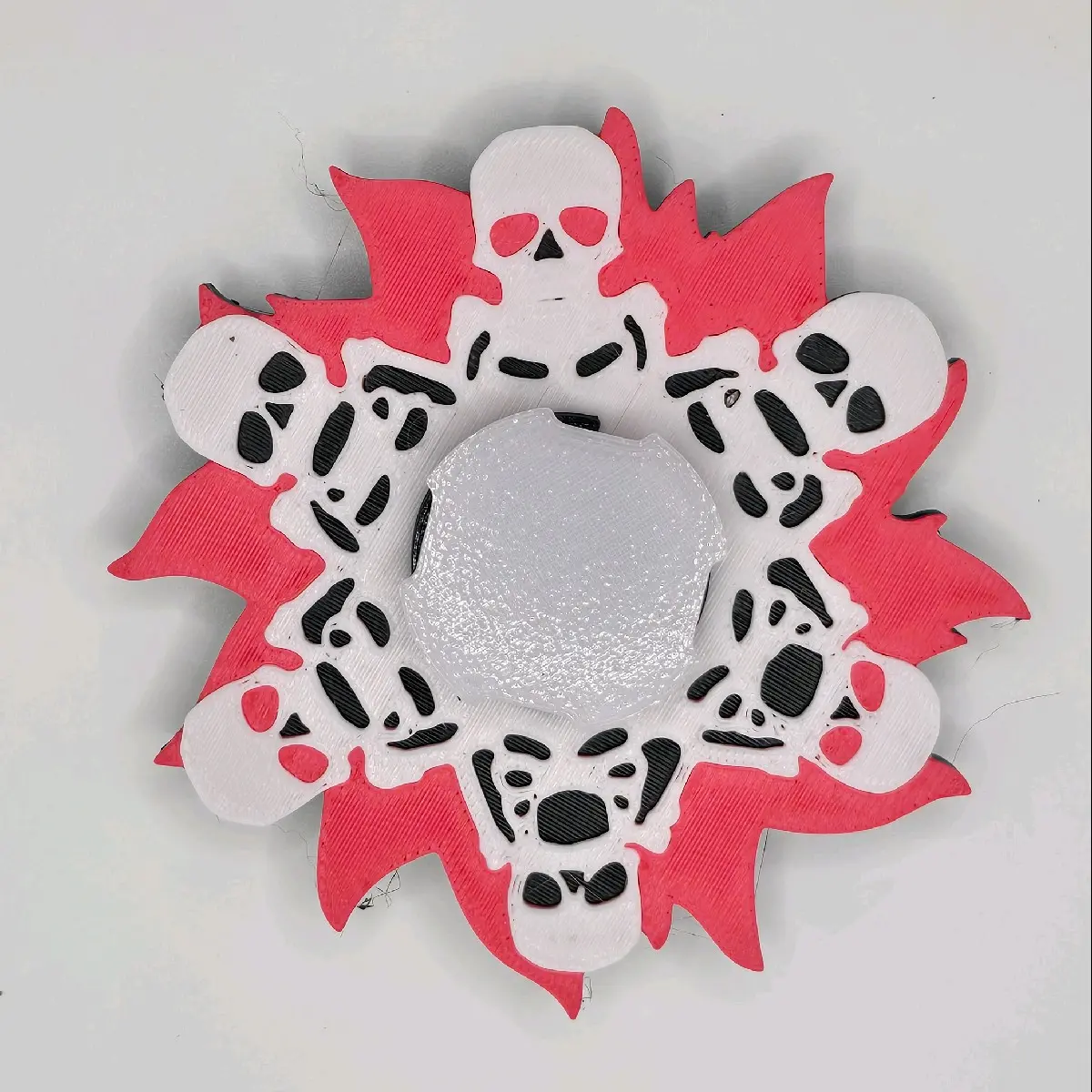 3D Printed Laughing Skeleton Spinner (Animation only viewable through methods in description)