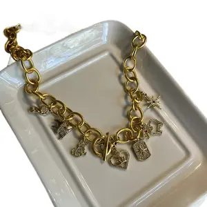 Bianca Charm Necklace - Gold-Tone Chain with Various Charms Jewelry Accessory