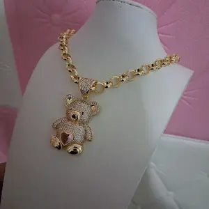 14 k gold layered Rolo chain ,6.5 mm x 16 with bear pendant .