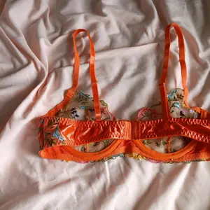 Orange Floral Bralette with Adjustable Straps and Comfortable Padding for Everyday Womenswear