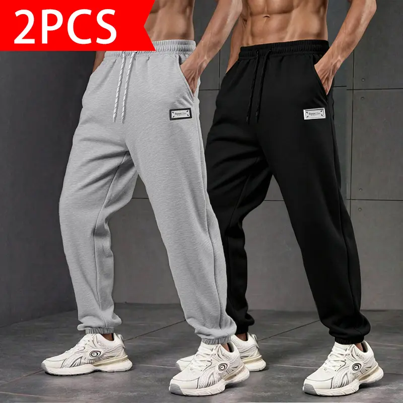 2-Pack Men’s Casual Jogger Sweatpants, Elastic Drawstring High-Waist Soft Knit Track Pants with Small Label Decoration, Loose Tapered Ankle Cuff Athletic Pants for Gym Workouts, Streetwear, Everyday, and Outdoor Wear, Black & Gray Two-Color Bundle