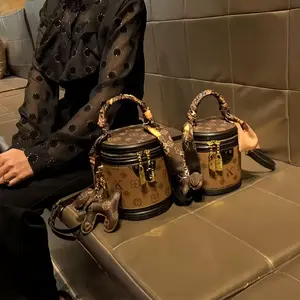 Elegant & Premium Leather Zebra-Print Crossbody Bag — Luxurious Bucket Bag Design — 2026 New Women's Crossbody Collection