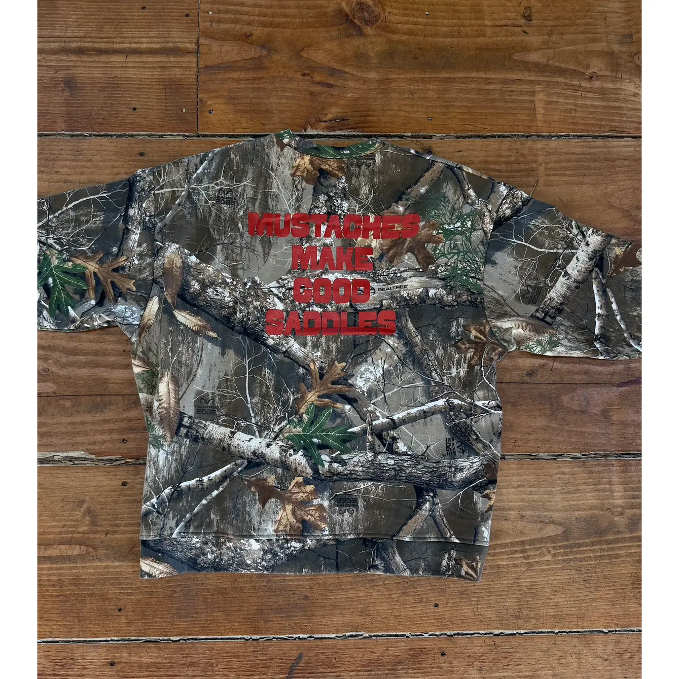 "Mustaches Make Good Saddles" Camo Crewneck