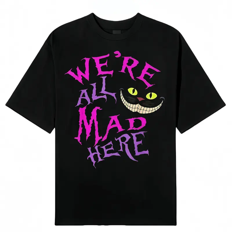 Women's Humor Graphic T-Shirt, "We're All Mad Here" Cat Print, Lightweight Round Neck Casual Streetwear Top for Summer Outfits, Shortsleeve, Crew Neck, Cotton, Loose-Fit, Tshirt, Lady, Retro, Women's Graphic Tees, Short Sleeve