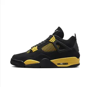 Retro Mid-Top Basketball Shoes in Black and Yellow with Suede and Mesh Panels, Visible Air Cushioning Unit, and Durable Rubber Outsole for Versatile On-Court and Casual Wear
