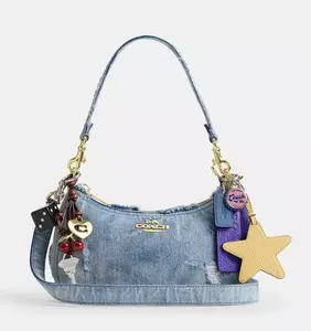 Teri Shoulder Bag in Loved Denim with Bonus Charms Light indigo