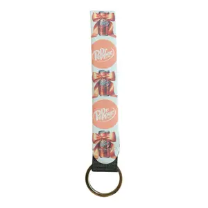 Dr.Pepper Keychain - Decorative Design with Bows and Circular Loop