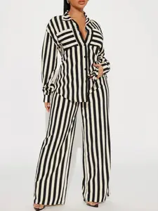Women's black and white striped lapel long-sleeved button-down shirt and wide-leg pants set. Fashionable women's clothing for everyday wear and office use, perfect for all seasons.