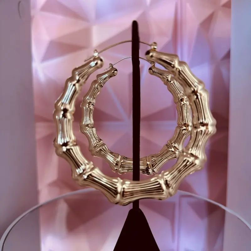 Gold bamboo style hoops earrings. Large. Very light weight. Adding Caribbean style to your summer