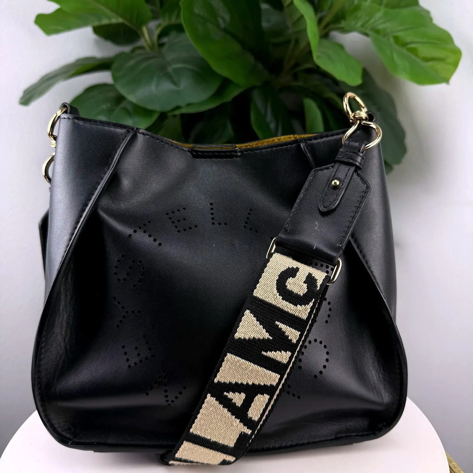 Pre-owned Black faux leather (Alter Mat), canvas jacquard shoulder strap Crossbody Authentic Stella McCartney Bag Black Perforated Logo Faux Leather, Alter Mat Faux Leather, Canvas Jacquard Shoulder Strap