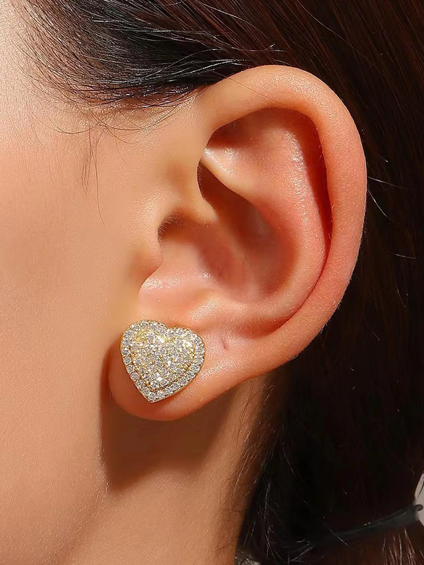 A pair of stylish and elegant heart - shaped micro - paved zircon stud earrings, sparkling ear jewelry. They are suitable for daily wear, vacations, dates and other occasions, and also make a delightful and delicate small gift. Stud Earring Jewelry