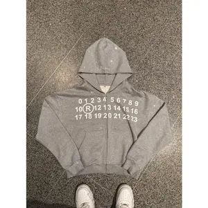 Streetwear, women’s fashion, hip-hop, retro punk, oversized sportswear, high-street casual pants, zip-up hoodies, men’s and women’s tops