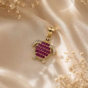 Pendiente de tortuga rosado 14K