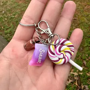Candy Keychain - Sweet Design with Colorful Lollipop Charm and "Sweet" Text on Purple Background