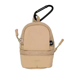 C.C Mini Sling Backpack Keychain - Multi-Color Design, Compact and Detachable, Ideal for Everyday Use in Taupe
