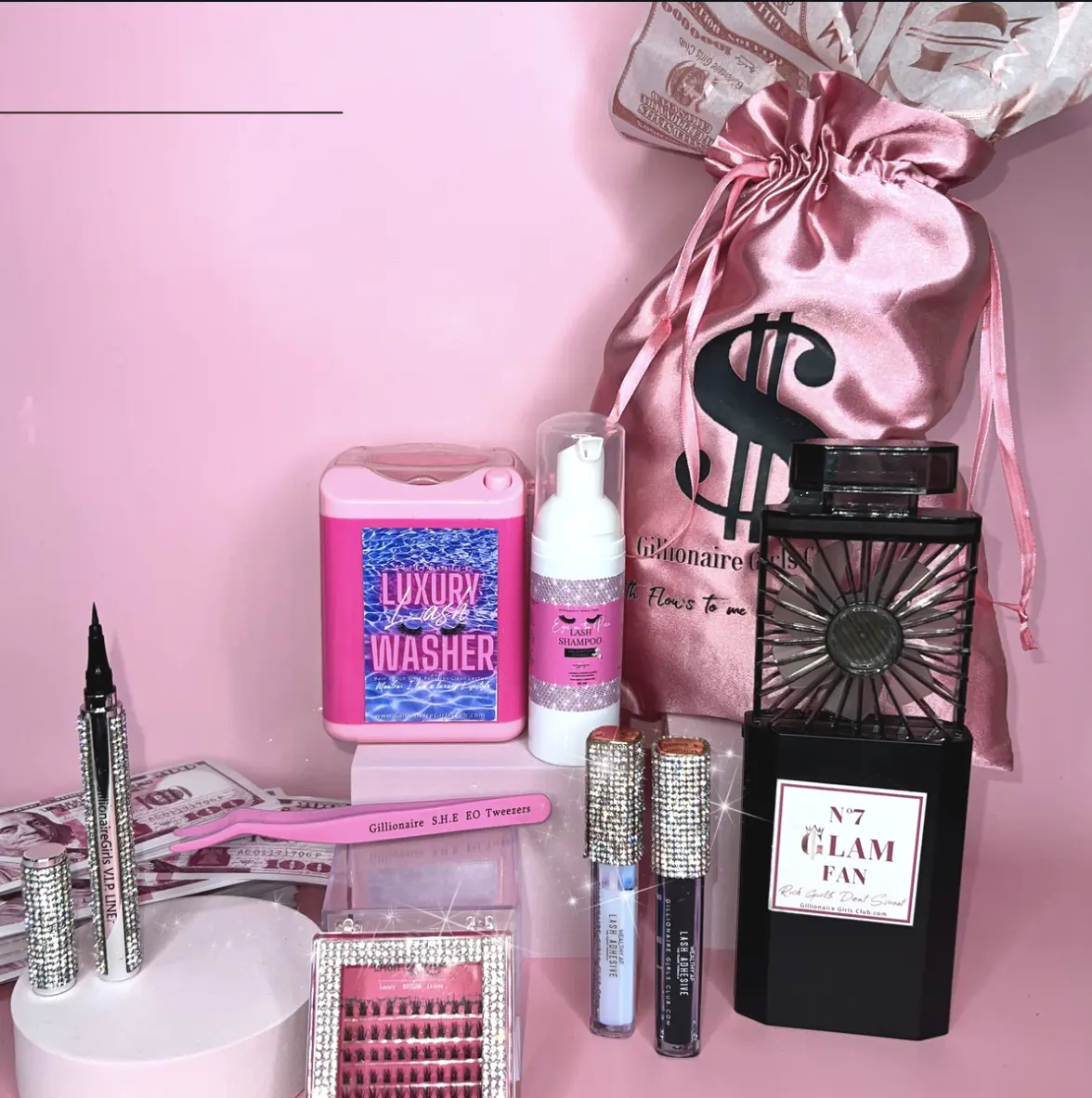 BIG MONEY $ Bundle: Ultimate Beauty Essentials  Elevate your glam game with this all-in-one bundle! Includes clear & black Wealthy AF lash glue, eyeLINEr, SHE.E.O Lash Applicator, lash washing machine, lash shampoo, glam fan, and #LashUNDIES