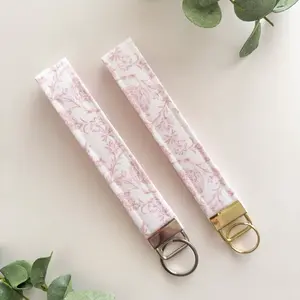 Baby Pink Whimsy Floral Keychain Wristlet with Gold Ring and Silver Buckle for Easy Access