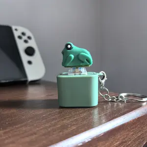 Rechargeable Frog-Calling Keychain with Realistic Croaking Sounds & Accompanying Lights for Stress Relief Fun Toy Gift for Adults & Children