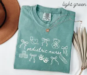 Personalized Pediatrics Comfort Colors Shirt • Coquette Bow Pediatric Nurse Work Tshirt • PEDS Nurse Gifts • Custom Pediatric Nurse Gift Fabric Top Womenswear Fit