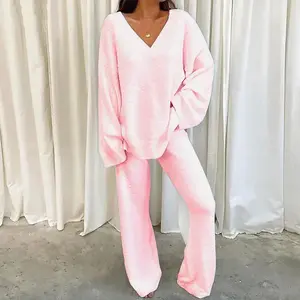 Women’s casual two-piece lounge set featuring a soft, chunky V-neck top and wide-leg long pants—basic tracksuit loungewear in minimalist womenswear
