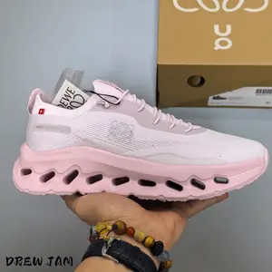 Cloud cushion running sneakers feature hollow segmented shock-absorbing foam outsole, crafted from ultra-breathable woven knit mesh, soft pale pink-white two-tone gradient design, lightweight slip-on fit