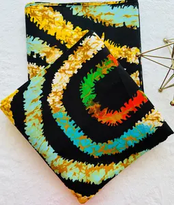 Tie-dye Pattern with Concentric Circles in Black, Orange, Yellow, Green, and Blue