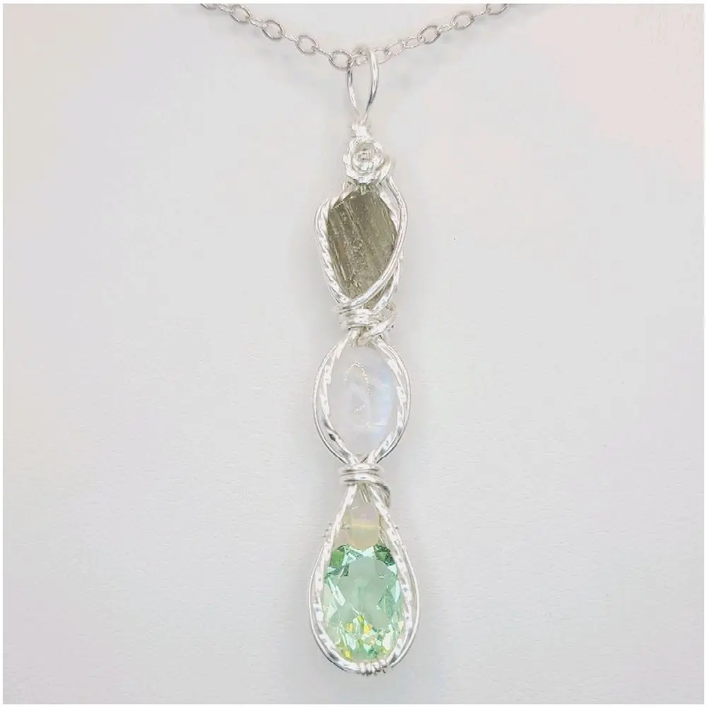 Moldavite, Moonstone, Opal, and Uranium Glass in .925 sterling silver wire