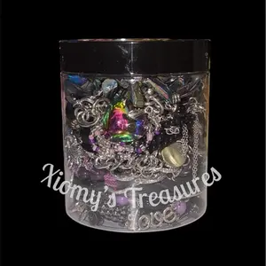 Xiomys Clear Plastic Jewelry Organizer Jar with Lid for Storage and Display Featuring Necklaces Bracelets Bangles Earrings Rings in Mixed Metal Tones