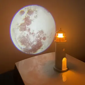 1pc Lighthouse Night Light That Projects A Clear Image Of The Moon. The Sensitive Human Body Sensing Switch And Long-brightness Function Can Be Set At Will. It Can Be Charged And Plugged In Via USB. It Is A Great Atmosphere Ornament And ChristmasGift