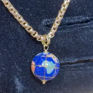 “gold pendant”
