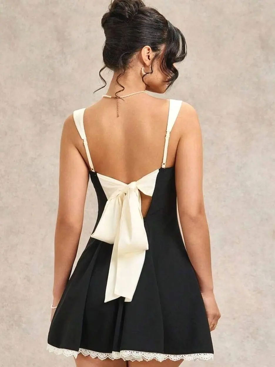 Black & White Lace Mini Dress | Backless Bow Design for Parties, Nightclubs, Music Festivals, Concerts & Holiday Outfits - TikTok Shop Black & White Lace Mini Dress | Backless Bow Design for Parties, Nightclubs, Music Festivals, Concerts & Holiday Outfits - TikTok Shop