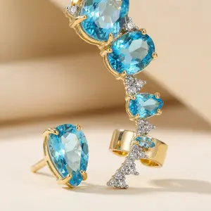 Nomad Jewels Sky Blue Crystal Wraparound Ear Cuff & Unisex Asymmetric High-Clarity Pear-Shaped Set - Blue Rhinestones, Simulated Crystal, Mermaidcore Daily Costume Jewelry, Modern Glamour Gift for Her, Blue Rhinestones Earrings, Simulated Crystal Earrings