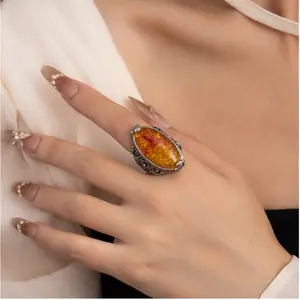 Vintage Baltic Amber Oval Ring – Elegant Hollow Floral Design