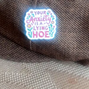 "Your anxiety is a lying hoe" Unisex Fashion Pin Brooch Badge, Personalized Letter Design, Casual Style Accessory for All Seasons, Perfect for Stylish Coats Decoration