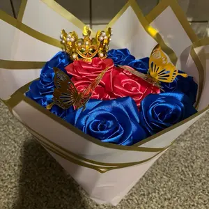 Wholesale Flowershop Royal Blue & Red Satin Roses with Gold Crown and Butterfly Decorations for Special Occasions