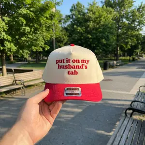 Put It On My Husband’s Tab Embroidered Hat: Funny Women's Trucker Cap