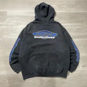 Vintage 90s Faded QuikSilver Center Sleeve Hit Grail Hoodie