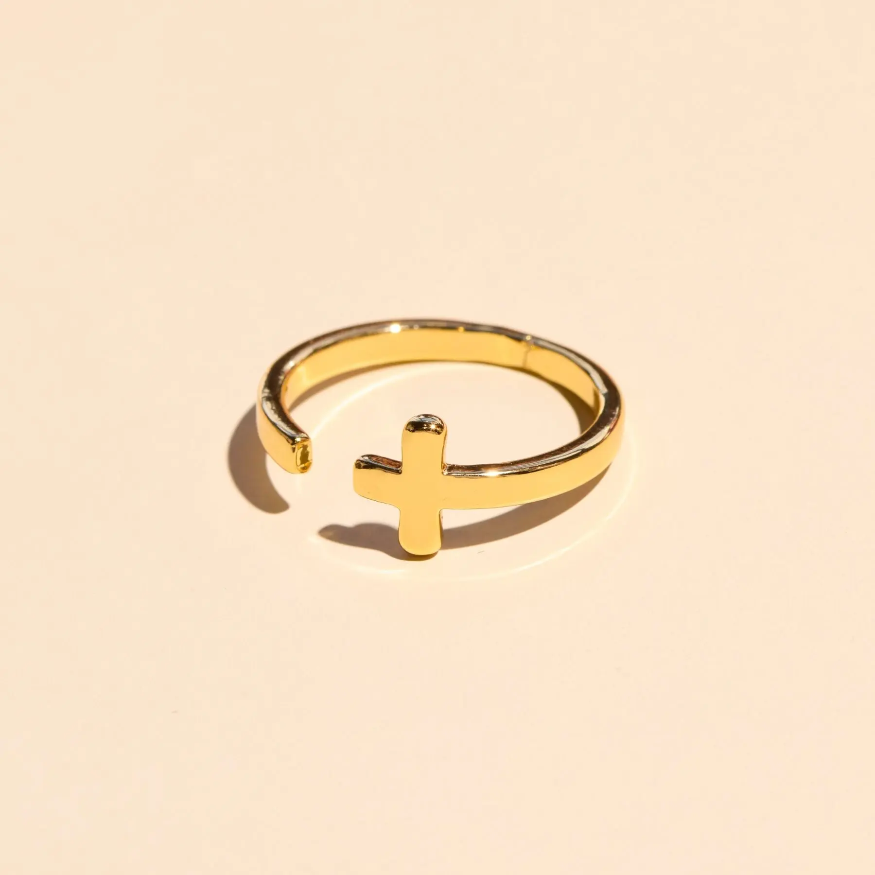 Gold Sideways Cross Ring