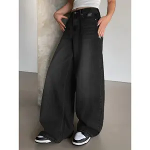 Adorable women’s vintage washed blue denim wide-leg jeans, oversized floor-length casual pants with distressed details, loose fit fashionable streetwear