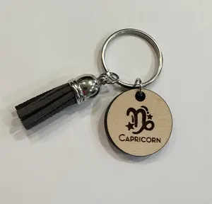 Zodiac Embellished Wood Key Chain with Colored Tassel - Carry Your Cosmic Energy!