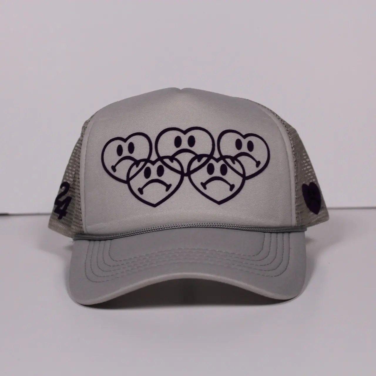 NOTHAPPYCLUB SAD HEART FACE OLYMPICS 2024 TRUCKER HAT
