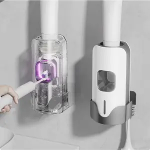 Automatic Infrared Toothpaste Dispenser |   No-Touch Wall Mounted Bathroom Squeezer with UV Sanitizer, No Mess & No Waste, Perfect for Kids & Family Sterilizing Mount