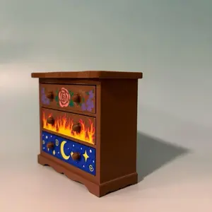 Fantasy inspired dresser bookshelf decor