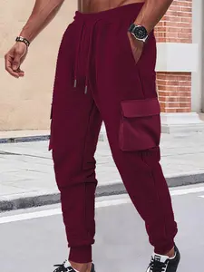 Men's outdoor sports multi-pocket hiking trousers, with drawstring design at the waist, tapered waffle trousers, suitable for outdoor sports, mountain and other outdoor scenarios, with a casual and free style, men's trousers.