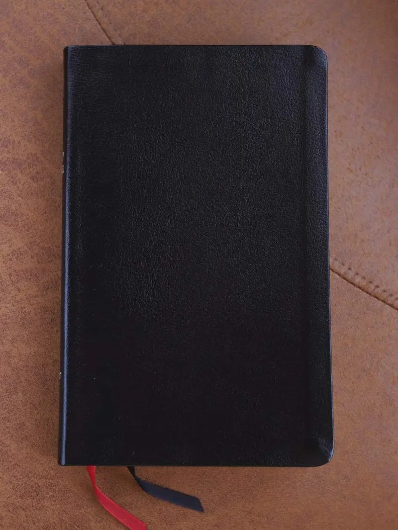 NIV Thinline Bible, Black Bonded Leather – Red Letter Edition with Comfort Print Bonded Leather
