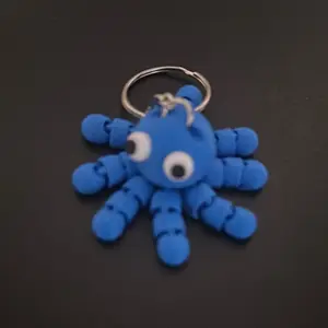 Articulated Octopus Key Chain - Blue Plastic Keychain with Flexible Tentacles and Eye Detail for Easy Attachment