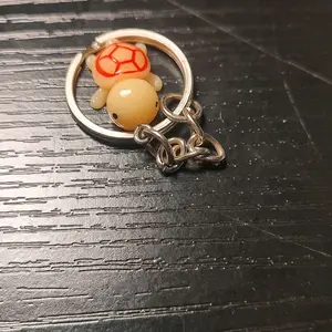 small orange turtle key chain