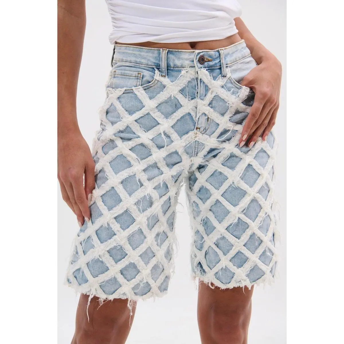 DISTRESSED AND STRESSED DENIM BERMUDA SHORT